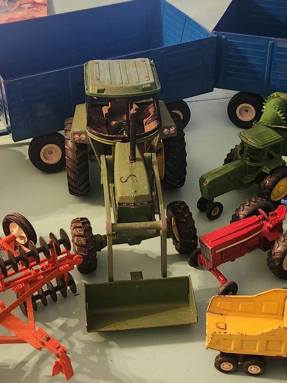Lot of Vintage John Deere Tractors And Acessories.